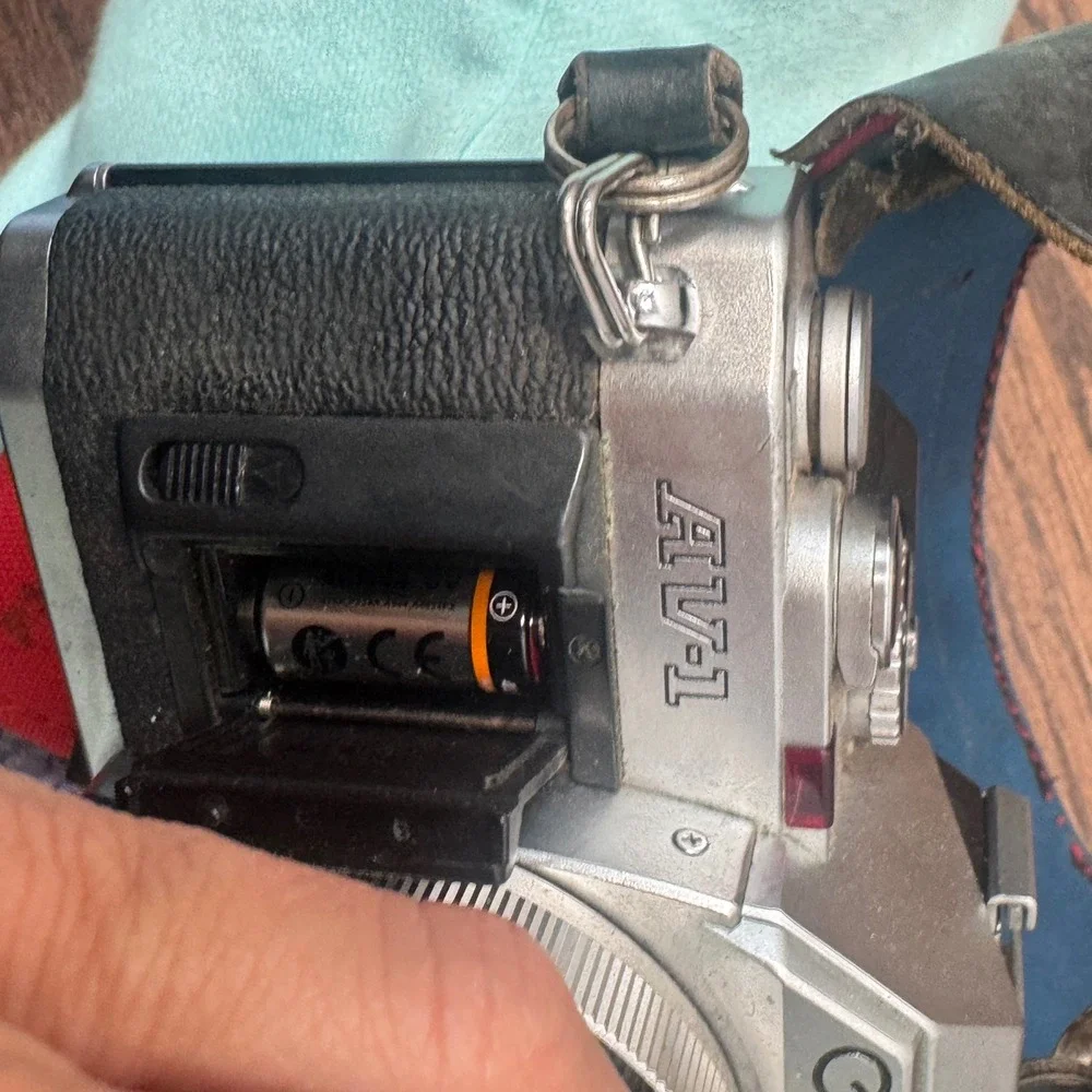 Canon AV 1 35mm SLR Film Camera Silver Sakar 35 135mm Lens Strap Untested
